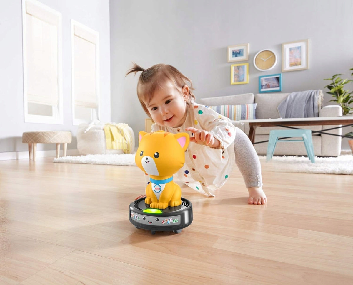 FISHER-PRICE GMX70 kot jeżdżący na odkurzaczu samojezdnym melodie i światła