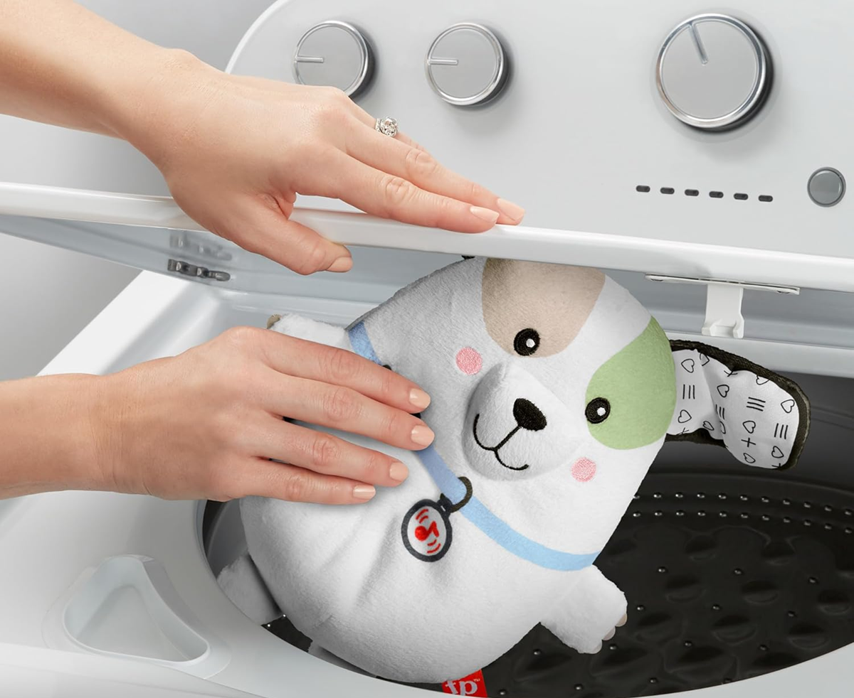 FISHER-PRICE Snuga Puppy peluche con melodías y vibraciones, perro 18 cm