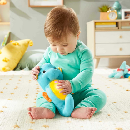 FISHER-PRICE peluche con melodías, sonidos y luz CABALLITO DE MAR para bebés