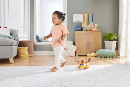 FISHER-PRICE Lil' Snoopy perro de arrastre 12 m+