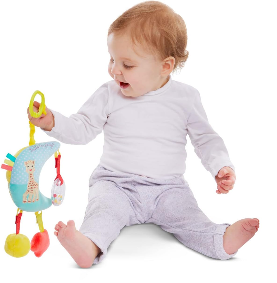 SOPHIE LA GIRAFE obesek z glasbeno skrinjico za voziček in posteljico 28 cm LUNA