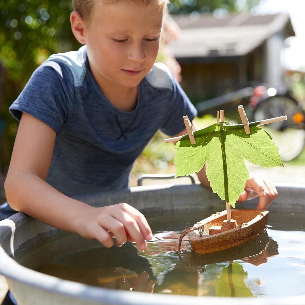 HABA Terra Kids plutovinast čoln in leseni elementi 22 cm 8 l+