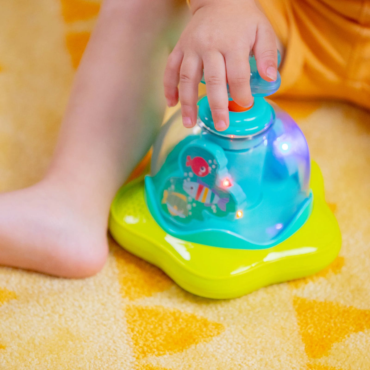 Bright Starts Press Glow Spinner Musikspielzeug 6m+