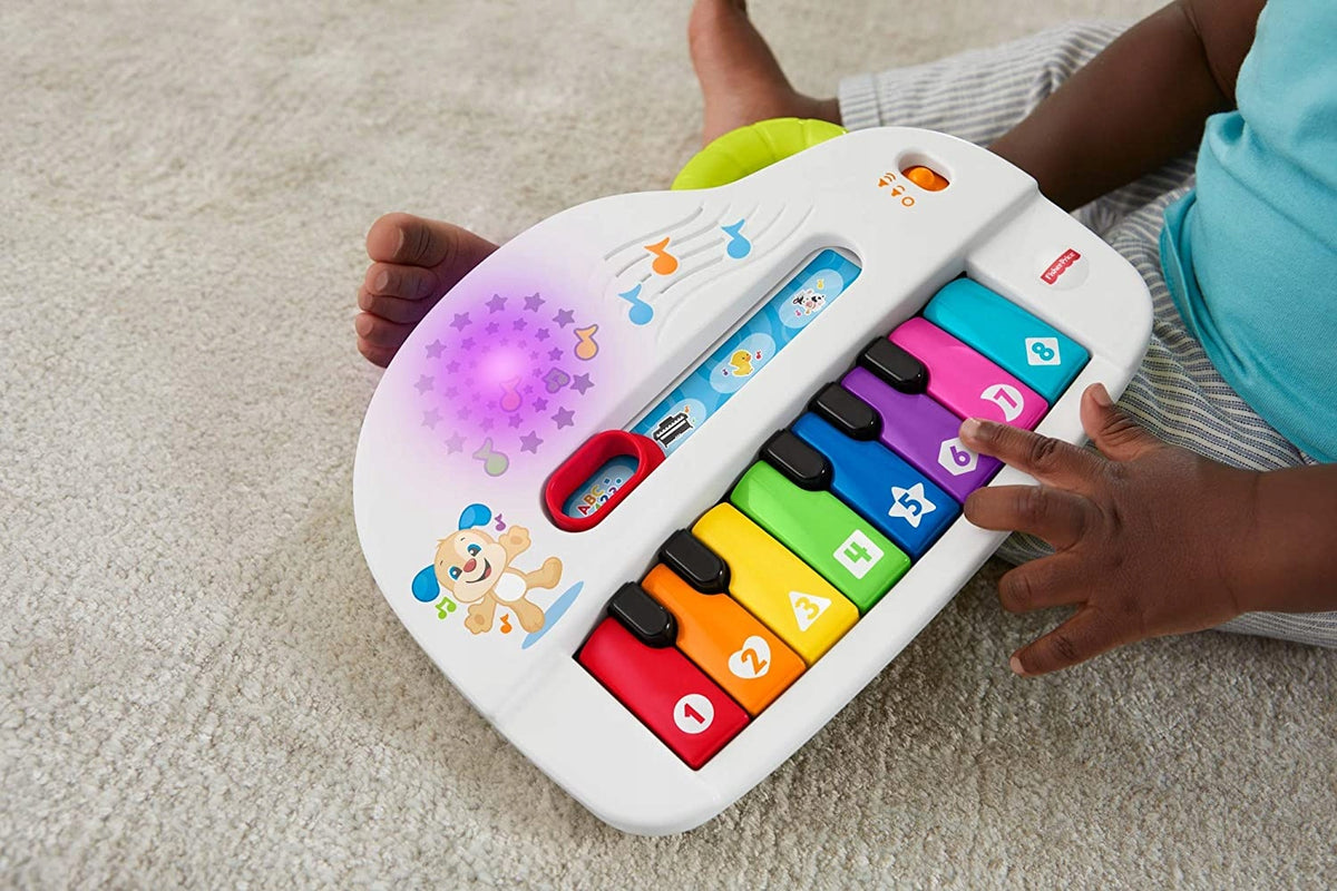 FISHER-PRICE GFK01 pianino 4w1 wersja niemiecka, interaktywny biały instrument dla dzieci 6m+