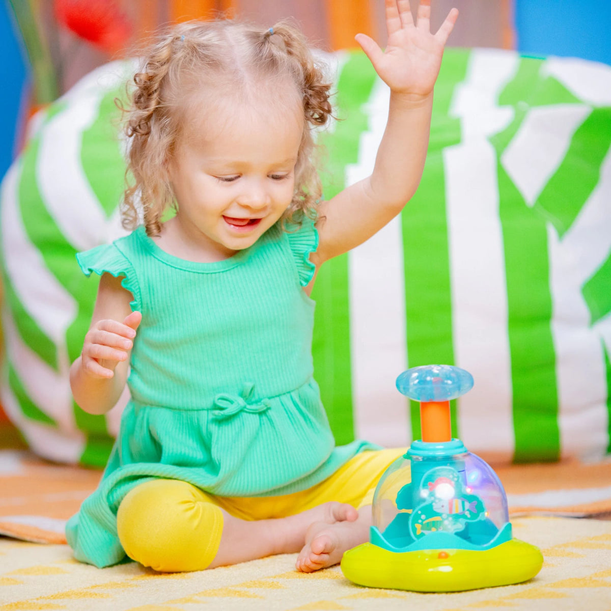 Bright Starts Press Glow Spinner Musikspielzeug 6m+