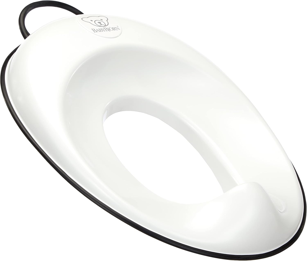 Reductor de inodoro BABYBJORN con apertura ajustable de 12 x 18,5 cm