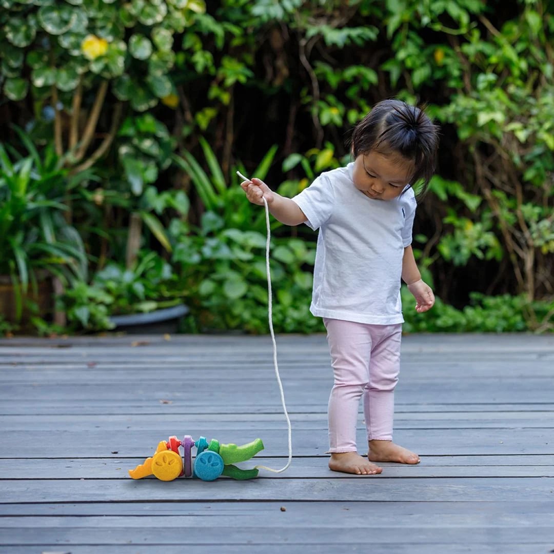 Dziecko ze sznurkiem aligatora PlanToys