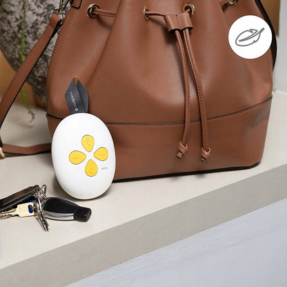 MEDELA SOLO laktator elektryczny 2-fazowy USB, kompaktowy biało-żółty laktator Medela przy torebce